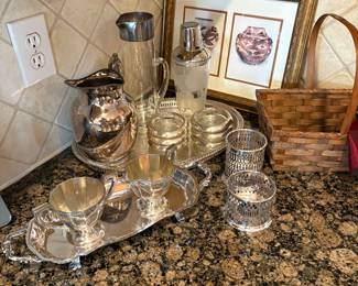 Coasters have sterling covers on the glass.  