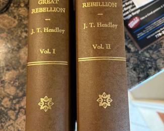 Books have been rebound into new covers.  Inside the new covers are the original books.  