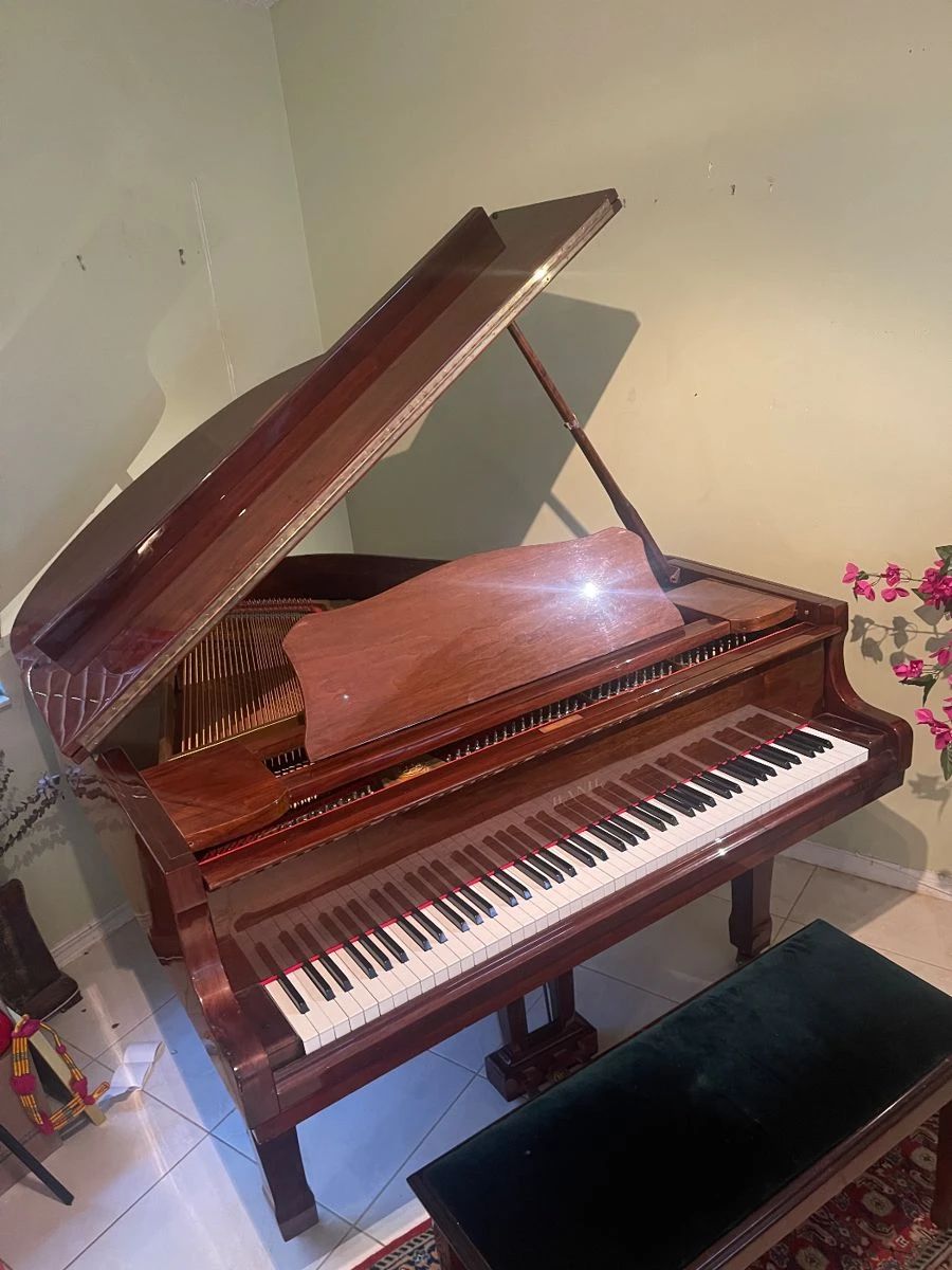 Beautiful baby grand piano gently used!