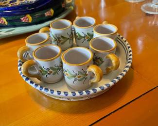 From Morocco, Spain, or one of the other travels, cappuccino tray and cups or good for a liquor shot