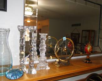 Very nice brass and glass pieces adorning the mantle