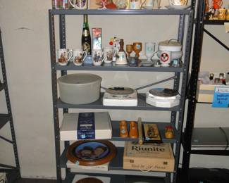 The shelfs hold collections of all kinds of items, vintage, new, modern, and treasured