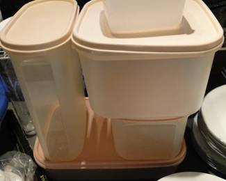 The photo's don't show the color very good but this is pink lid Tupperware