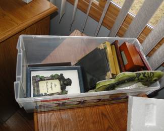 Plastic bin of frames and such
