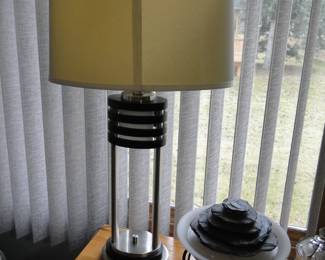 Mid Century Modern or Art Deco?  Once you bring it home you can make up your own story