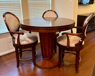 Pub table with three swivel chairs