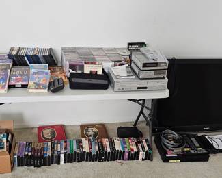 DVDs, CDs, VHS tapes and players 