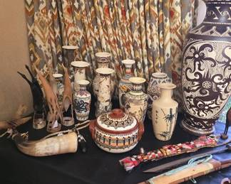 Hand painted pottery from Malaysia and around the world, Water Buffalo Horn carvings, and Dayak Headhunter Swords from Borneo