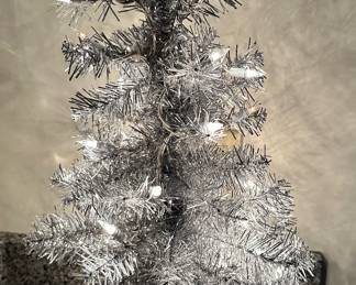 silver tinsel Christmas tree