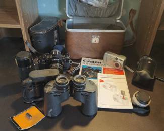 Canon A1 Camera With Accessories Lenses And Binoculars 