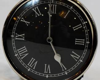 915 - Decorative Clock 7" You are buying a used as-is electric/electronic item. We do not guarantee all components are present, and if it is not expressly stated, it is untested.