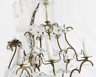 671 - Chandelier w/ Glass Prisms 25" You are buying a used as-is electric/electronic item. We do not guarantee all components are present, and if it is not expressly stated, it is untested.