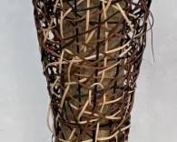 1104 - Woven Floor Lamp 56" You are buying a used as-is electric/electronic item. We do not guarantee all components are present, and if it is not expressly stated, it is untested.