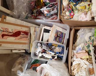 large boxes and bags of trims and different needle craft threads and canvas