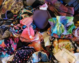 more clothes, scarfs, bathing suits and workout clothes and still unpacking