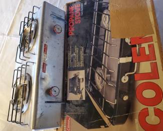 2 Coleman camp stoves one is new in the box