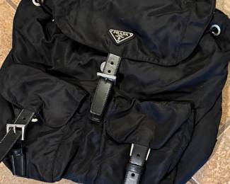 This Prada backpack will be AUCTIONED by text thread on Sunday Feb 23 starting at 2:00 pm. If you want to be added to the text thread auction text your name  and number “Prada” to 870-338-0095