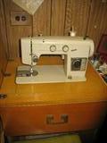 Signature Sewing Machine/Cabinet/Pull out stool