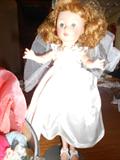 Toni Doll Bridal Dress/veil/Shoes.
Small case with other clothes.Not sure who's they are.No labels.