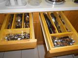 Several Stainless Flatware Sets