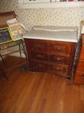 Mid 1800's Solid Mahogany Washstand with Marble Top/Backsplash.
Hand Carved Teardrops on handels