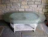 Rattan table with glass top