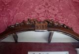 Antique mirror with carved mahogany frame