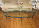 Beveled glass top coffee table with wrought iron base