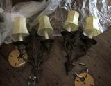 Vintage wrought iron lighted wall sconces