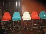 Eames Era 5 fiberglass shell stools.