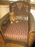 1920's Wicker Hand woven chair with needlepoint back.