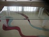Beveled Glass Cocktail Table
with Abstract Bubble Lucite Legs.