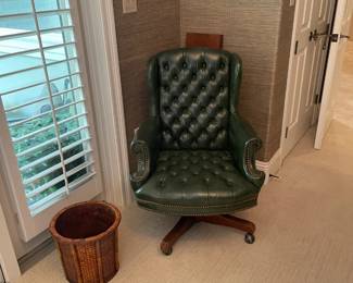 Outstanding vintage swivel / rocking tufted office chair. 