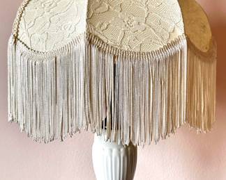 Vintage Art Nouveau Brass Tone & Porcelain Table Lamp With Fringed Shade
Lot #: 16