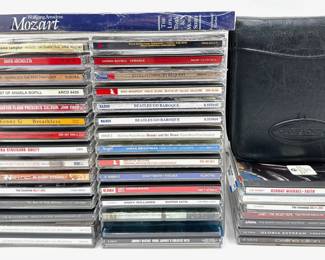 Over 30 Music CDs In Plastic Storage Case & Unboxed CDs In Binder
Lot #: 72