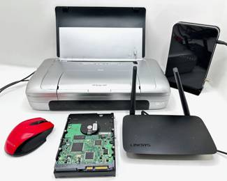 HP Deskjet 460 Printer, 2 Routers, 200MB Baracuda Hard Drive & Insignia Mouse
Lot #: 141