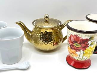 Hammered Gold Teapot, 2 Sets Of Mugs, 1 With Matching Spoon, All Appear Unused
Lot #: 120