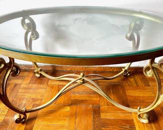 Vintage Glass Oval Coffee Table With Bronze Tone Hand Forged Metal Base
Lot #: 3