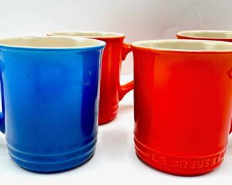 4 Le Creuset Stoneware Mugs: 4 Red, 1 Blue, France
Lot #: 101