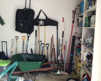 Shovels, rakes, wheel barrow