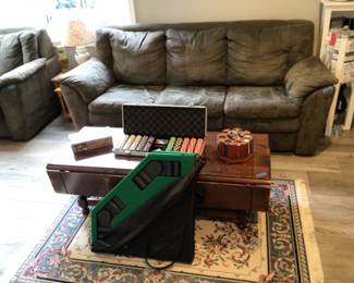 Couch, coffee table, area rug & games