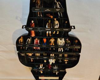 Darth Vader display case opened to show many figurines