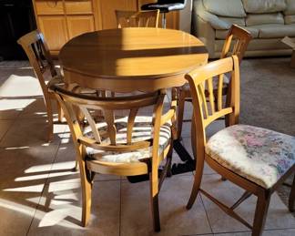 table six chairs and 3 leaves