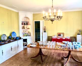 English mahogany dining table with 1 more leaf and brass accents