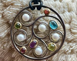 Sterling and semi precious. 