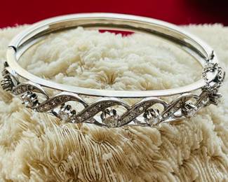 Vintage 14 karat white gold diamond bangle. 