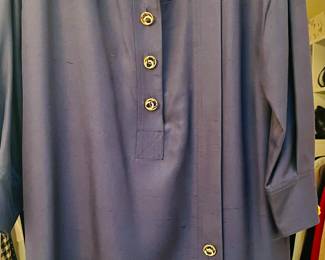 Classic navy Chanel dress with blue and gold CC buttons.