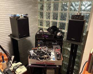 Recording equipment including Pro Tools M Bos, speakers, speaker stands, equipment rack, recording interfaces, and more. 