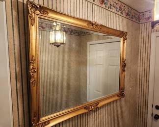 Nice heavy gold mirror.  North Carolina maker