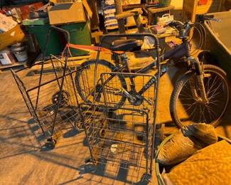 SCHWINN BICYCLE AND TWO METAL CARTS